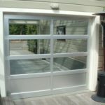 Gray colored glass garage door