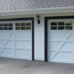 A closed white aluminum garage door