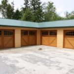 four wooden carriage garage doors